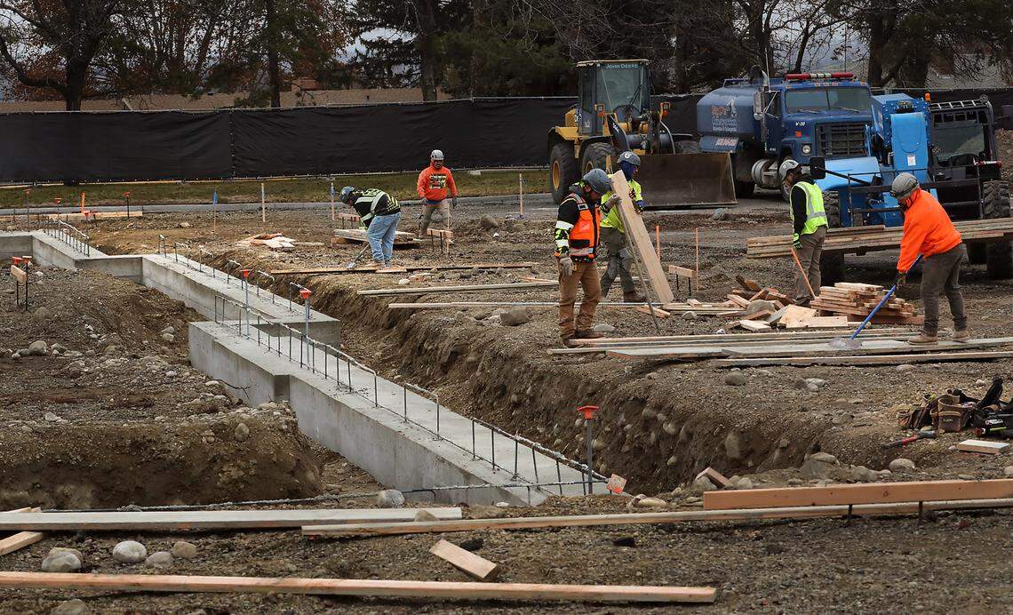 Construction workers scrape and stack the boards used to form the concrete foundation for the new 5,000-square-foot Chick-fil-A restaurant in Kennewick. The building at 7009 W. Canal Drive will have inside seating for 70, patio seating for 24 people, 96 parking stalls and a two-lane drive-thru.