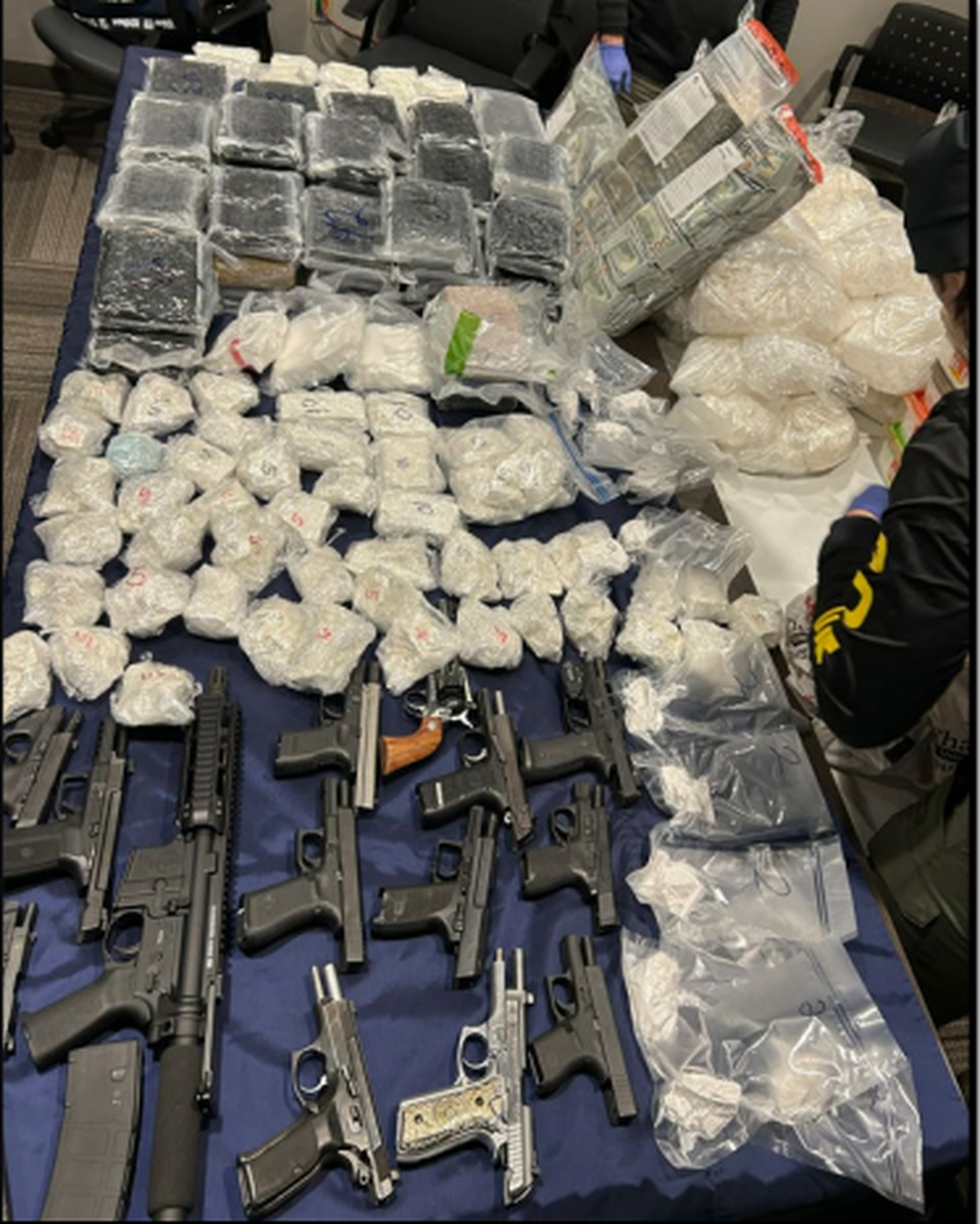 More than 164 pounds of powdered fentanyl, more than 200 pounds of methamphetamine and 16 firearms were seized at residences across the Tri-Cities on March 3, 2026. It was the largest seizure of illicit drugs in the history of the Eastern Washington District Attorney’s Office. Some of what was seized is shown.