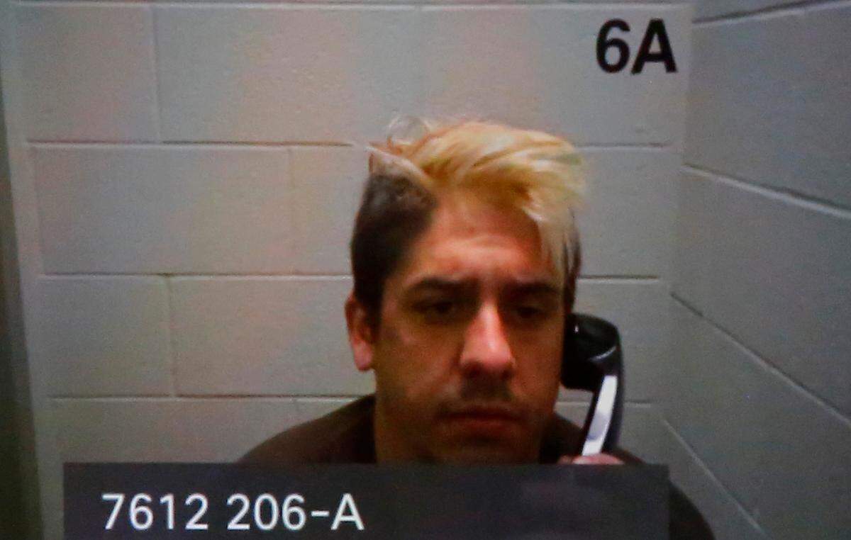 Aaron J. Hill, 27, makes his preliminary appearance in Benton County Superior Court via video Thursday .