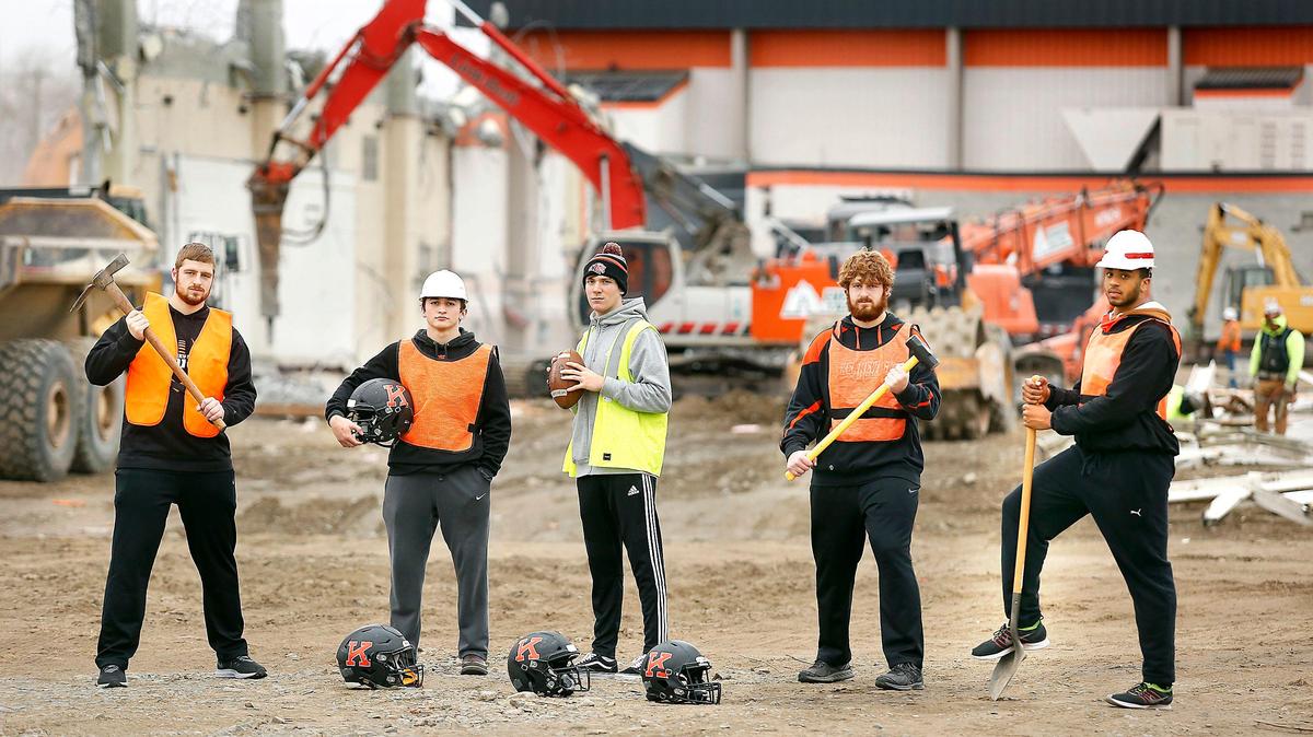 Kennewick High football players have been hard at work building a winning football season on the field against their opponents while demolition crews have been razing their high school campus dating back to 1951 for a new two-story school building. From left, they are: Baiden McElroy, Kaleb Stevenson, Blaine Chavez, Baylor McElroy and Jagger Childs.