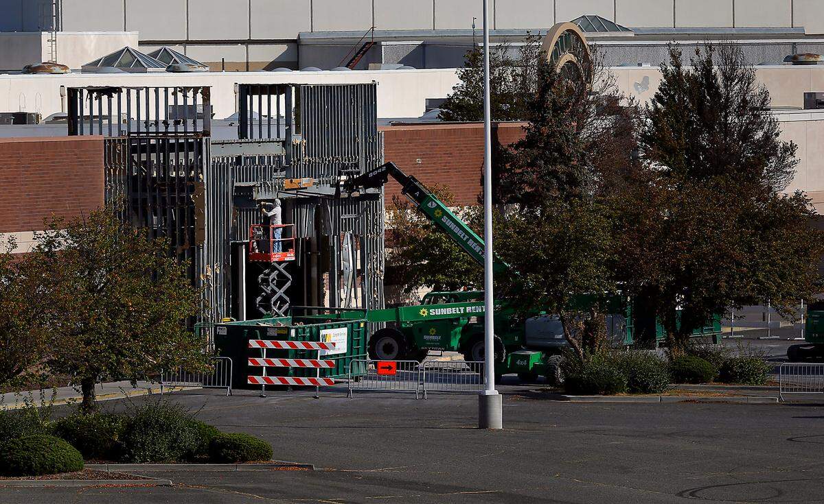 Construction work has started on an entrance to the former Sears store at Columbia Center mall.