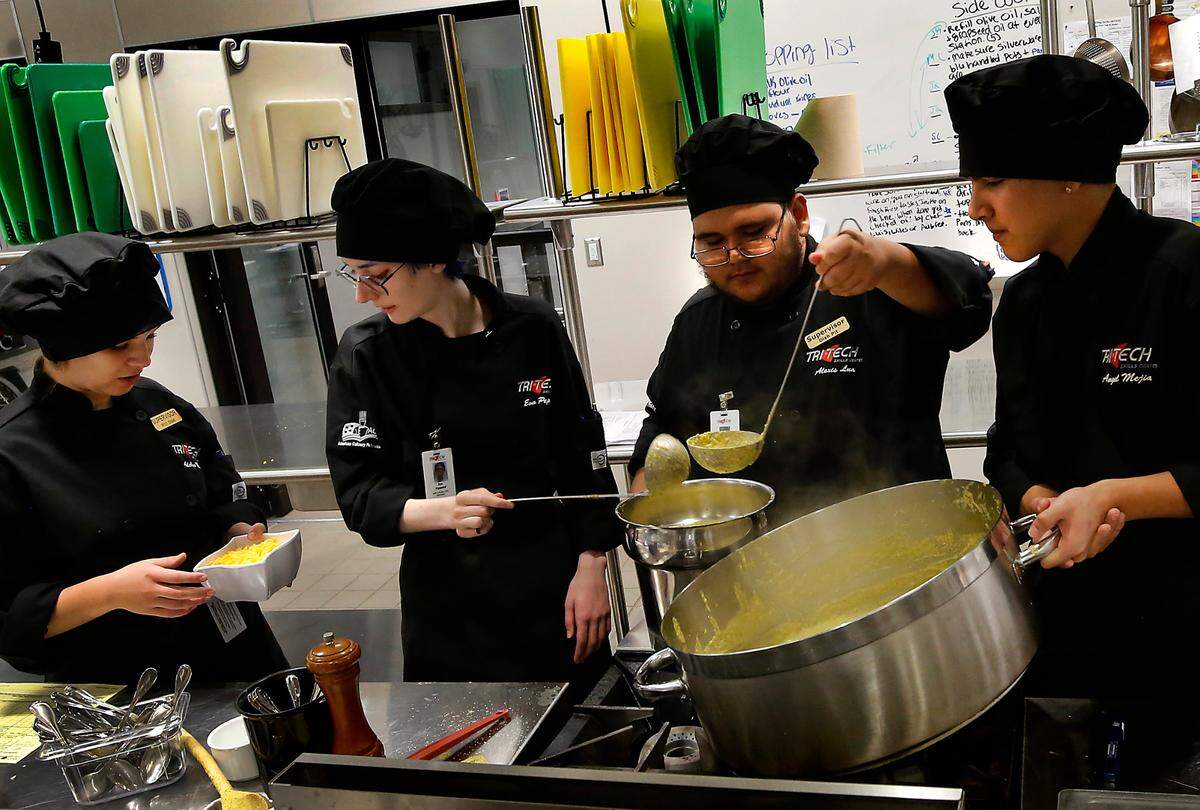 Culinary students work together in 2022 at the Tri-Tech Skills Center kitchen in Kennewick on the annual fall soup competition.