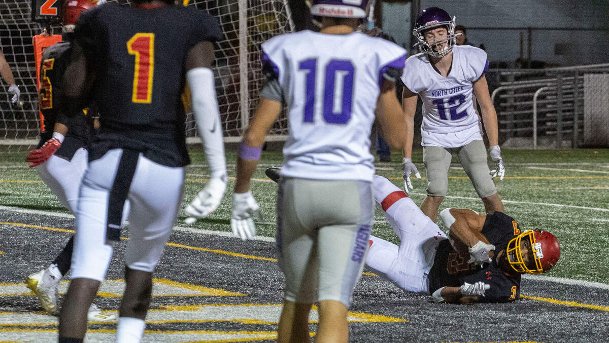 Kamiakin senior EJ Hawkins makes a touchdown for the Braves during the playoff game against the North Creek Jaguars at Lampson Stadium in Kennewick.
