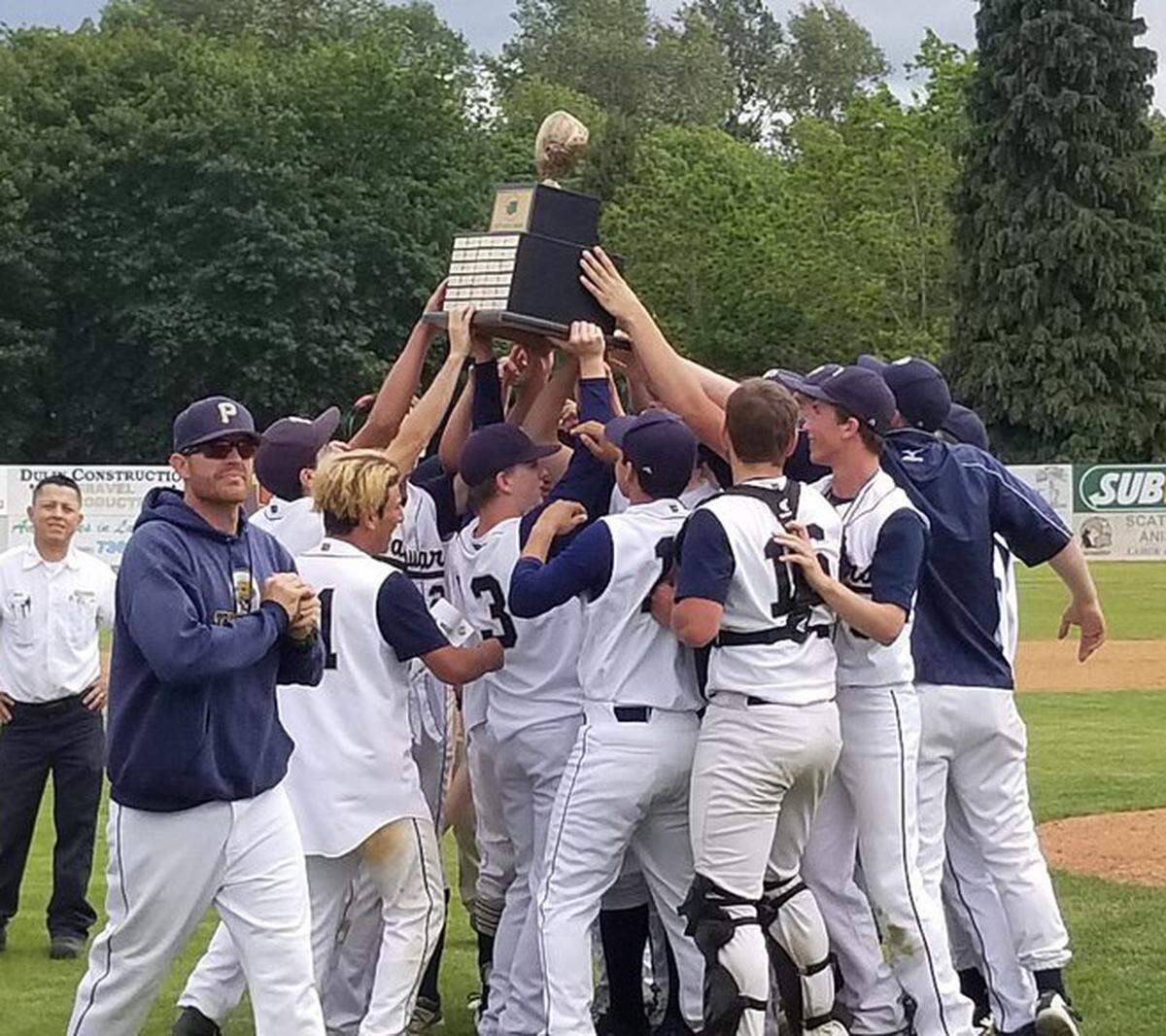The Tri-Cities Prep Jaguars celebrate their 2B state baseball title. Prep beat Brewster 14-7.