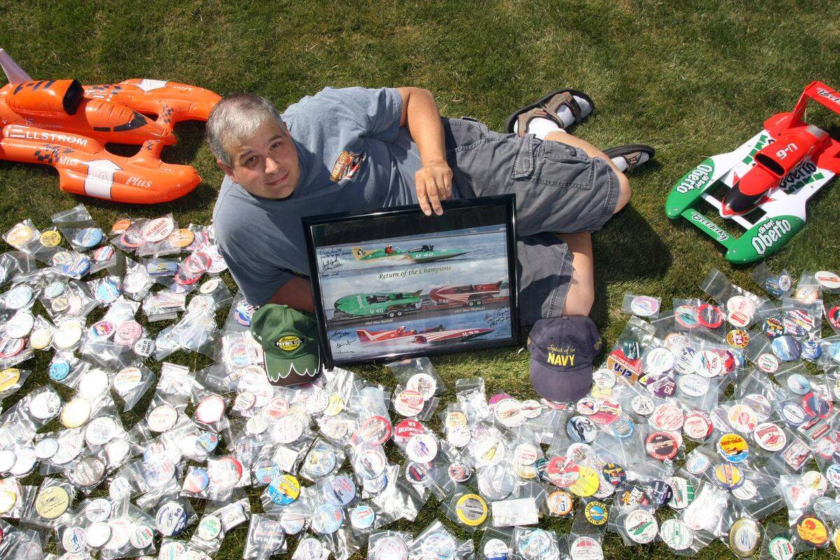 Chris Denslow, of Kennewick, shown here in 2008, was a lifelong unlimited hydroplane racing fanatic and had collected hundreds of boat buttons and other racing memorabilia from races across the country over the years.