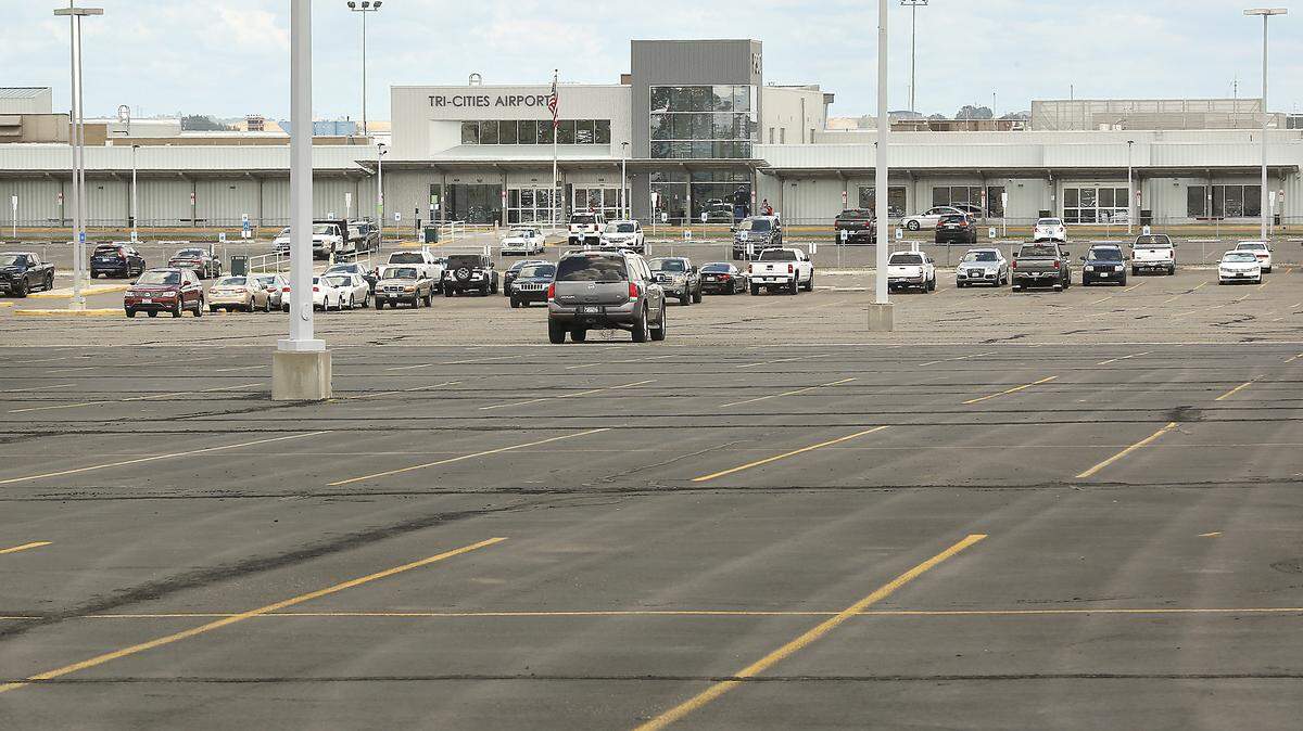 The parking lots, both short and long term, at the Tri-Cities Airport in Pasco are nearly empty during the drastic reduction in air travel during the coronavirus pandemic.