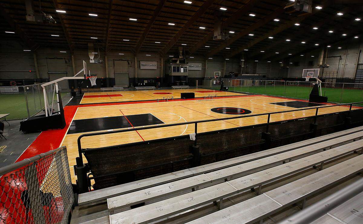 A pair of basketball courts for Clubhouse Sports Academy sit in the middle of the arena space inside the HAPO Center at 6600 Burden Blvd in Pasco.