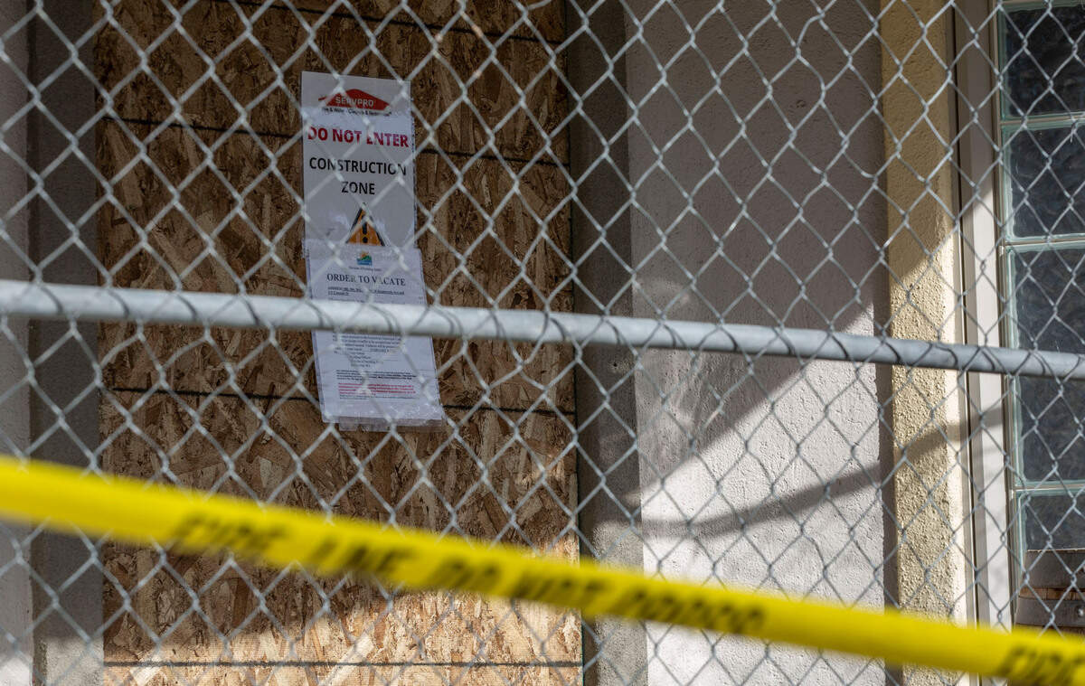 An order to vacate sign hangs on the entrance to Foodies and downtown Kennewick. The restaurant and several other businesses have been ordered to vacate for the time being after a fire ravaged the Cascade building in downtown Kennewick, WA.