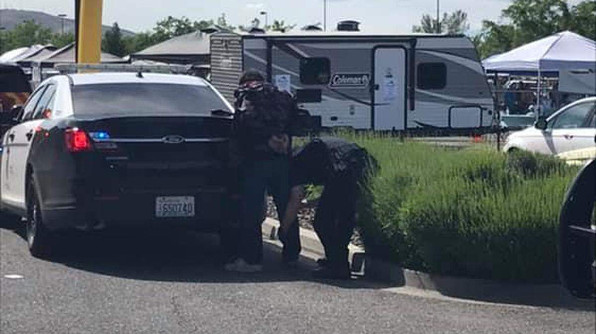 Kennewick police arrested a man after he tried to grab a cash box during a PetSmart event.