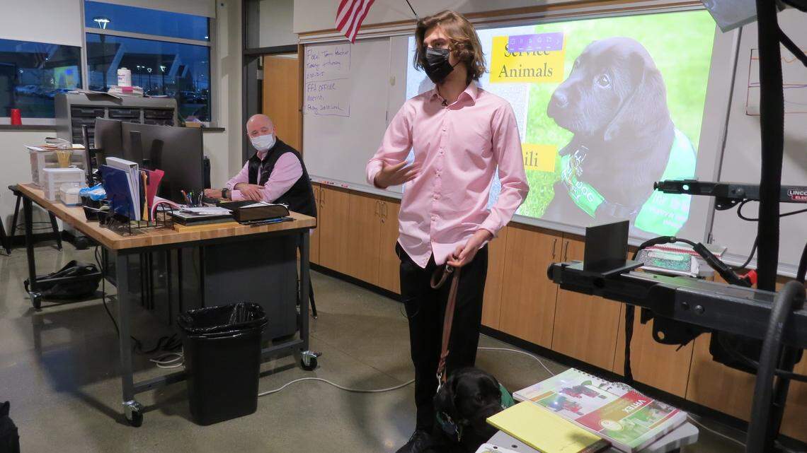 Kennewick High student Carson Williams, 17, spent more than a year and a half raising Chili to be a guide dog for the blind.
