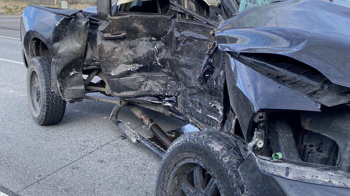 A woman in this pickup was hurt after failing to yield to traffic as she crossed Highway 395 in Pasco.