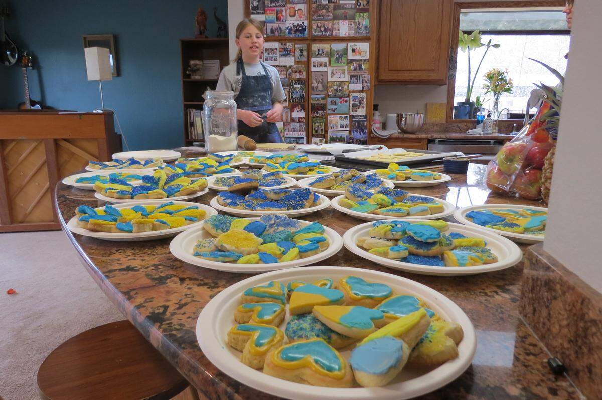 Several dozen cookies are ready to be delivered as part of 9-year-old Sage Egbert’s mission to help people in the Ukraine.