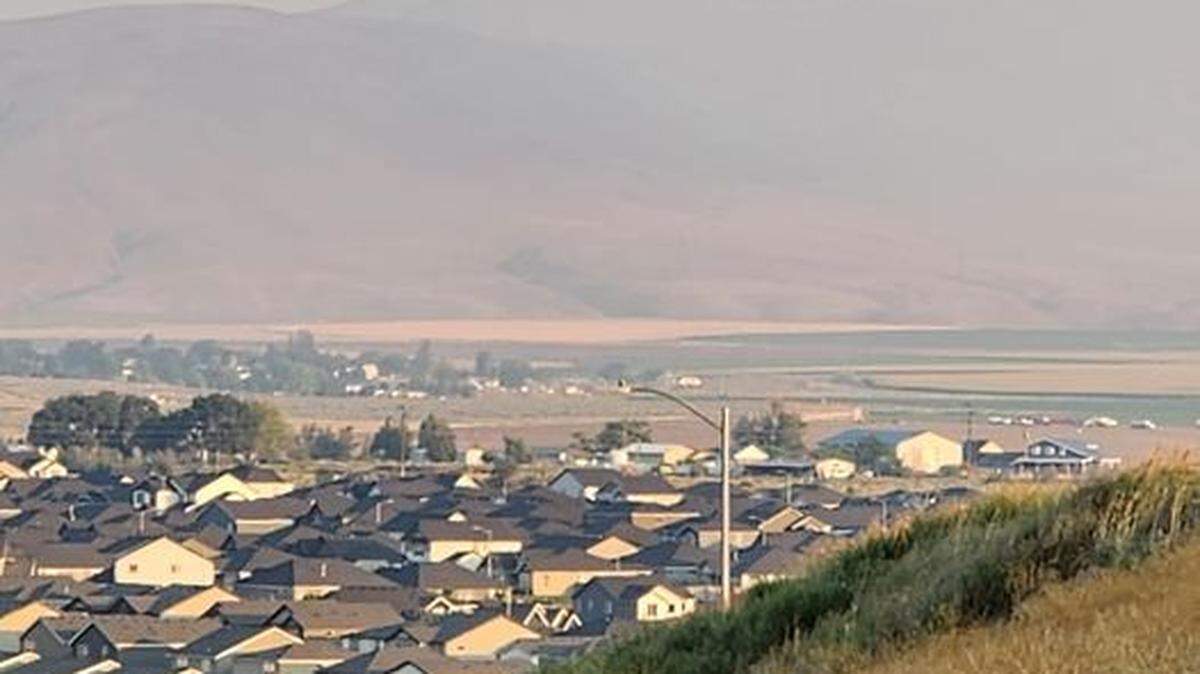 Retired West Richland Police Chief Ben Majetich took this photo of smoke drifting into West Richland from the west on Thursday.