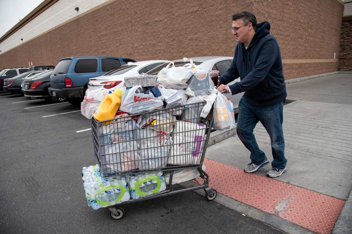 Robert Goldstein, 49, of Kennewick took time on Friday to stock up on food and other necessities at WinCo. Goldstein said his biggest concern is schools closing for six weeks. “The ripple effects will be felt for months, if not years,” he said.