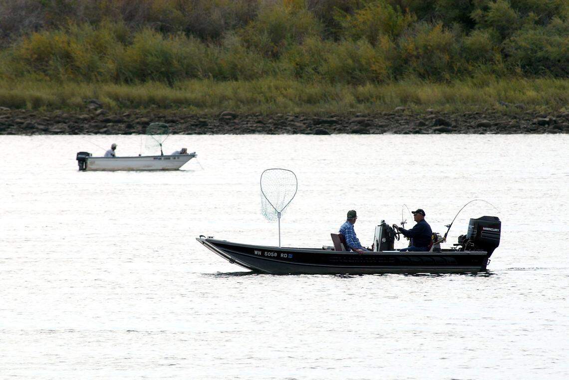 Salmon anglers try their luck on the Columbia River just upriver of the Vernita Bridge. The popular fishing site attracts anglers from states throughout the Pacific Northwest.