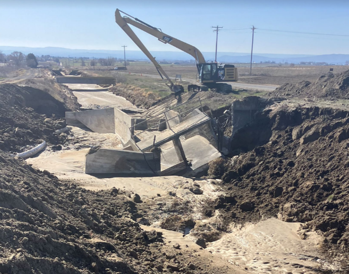 Heavy equipment works to clean up the Potholes Canal breach north of Franklin County.