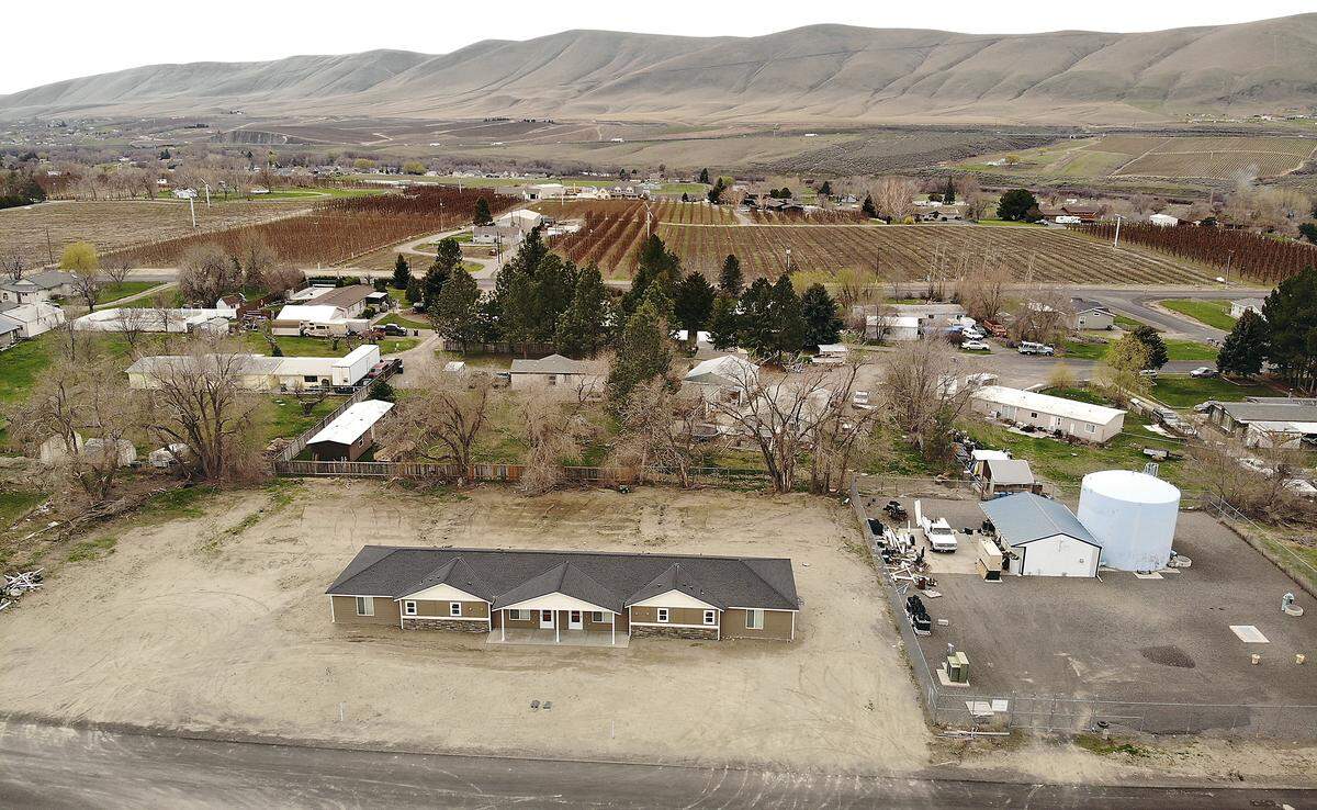 Benton City residents near this recently constructed duplex on West Breezie Lane in Benton County say the farm labor housing was misrepresented as a residential development. They want Benton County code enforcement officials to step in before additional planned dwellings are built. Watch a video at: tricityherald.com/video