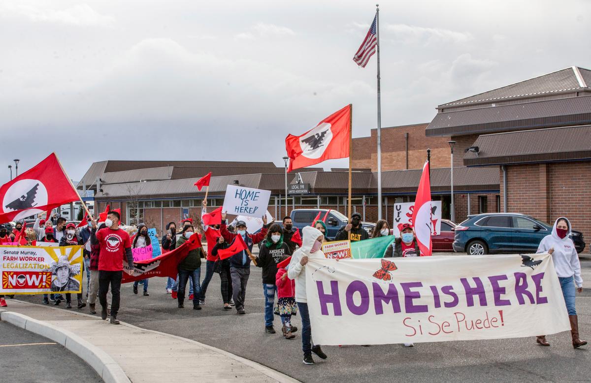 About 50 United Farm Workers members marched in Pasco, joining a nationwide call for immigration reform.