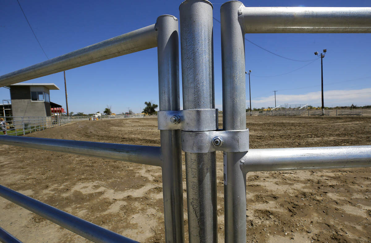 With the assistance of Big D’s Construction, volunteers from the fair board and rodeo committee demolished the old arena wooden fencing and replaced them with new metal poles and panels.