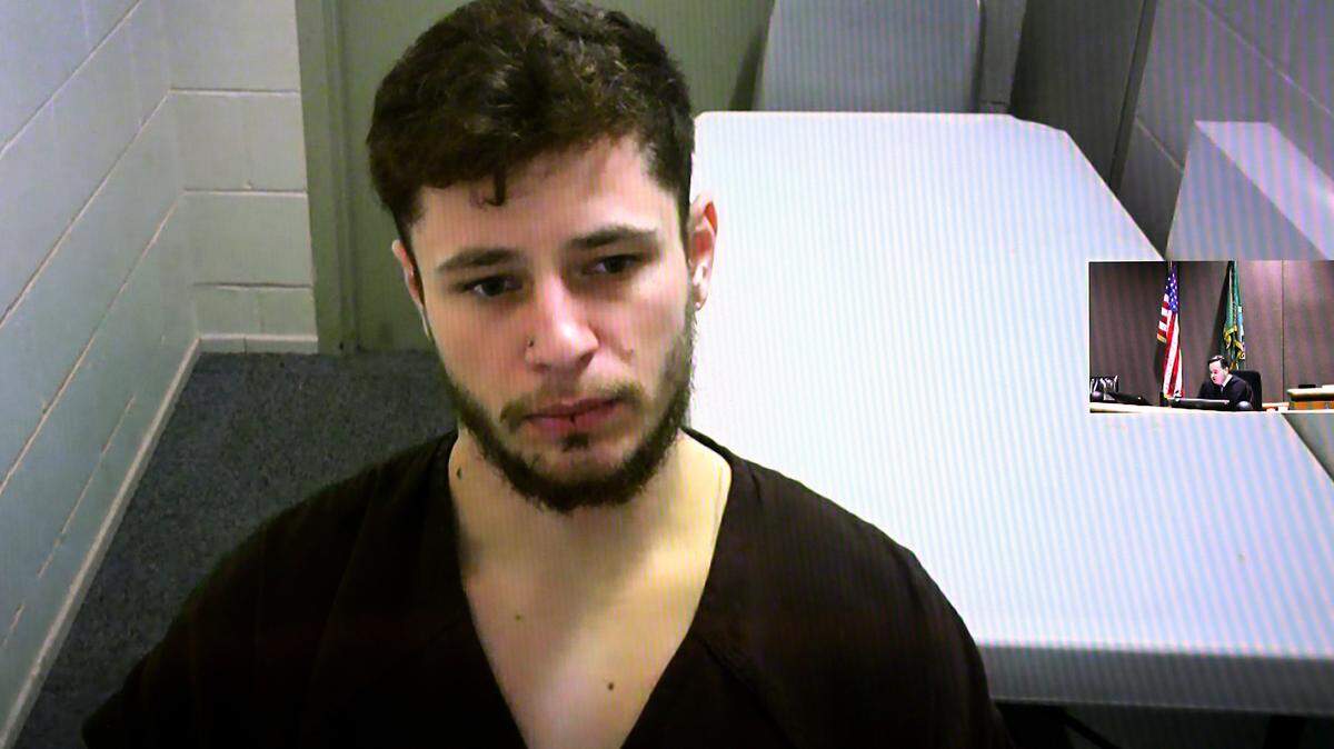 Dillon Winters appears before Judge Joe Burrowes in Benton County Superior Court Monday via a video link from the Benton County Jail. Two police officers shot the 27-year-old man after he allegedly charged at them with a knife in Kennewick apartment complex parking lot last week. He was booked into the Benton County jail on suspicion of first-degree assault.