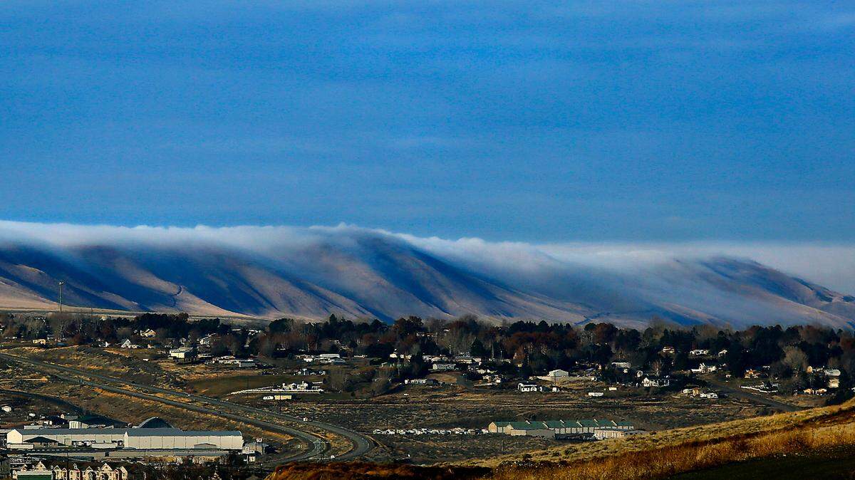 Low clouds roll over the Horse Heaven Hills in Badger Canyon earlier this year.