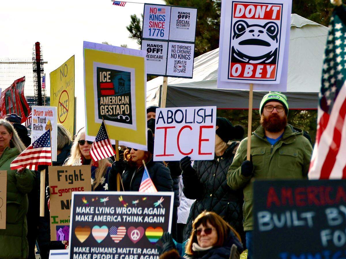Several hundred demonstrators lined both sides of Columbia Center Boulevard near the mall on Jan. 10, waving signs and shouting to passing drivers.