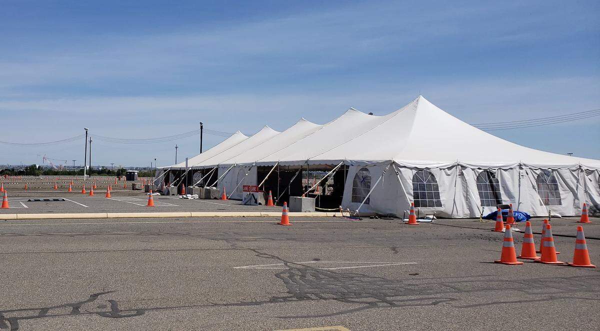 There was no waiting line for a COVID-19 vaccine Tuesday at the Benton County Fairgrounds, with hundreds of appointments unclaimed.