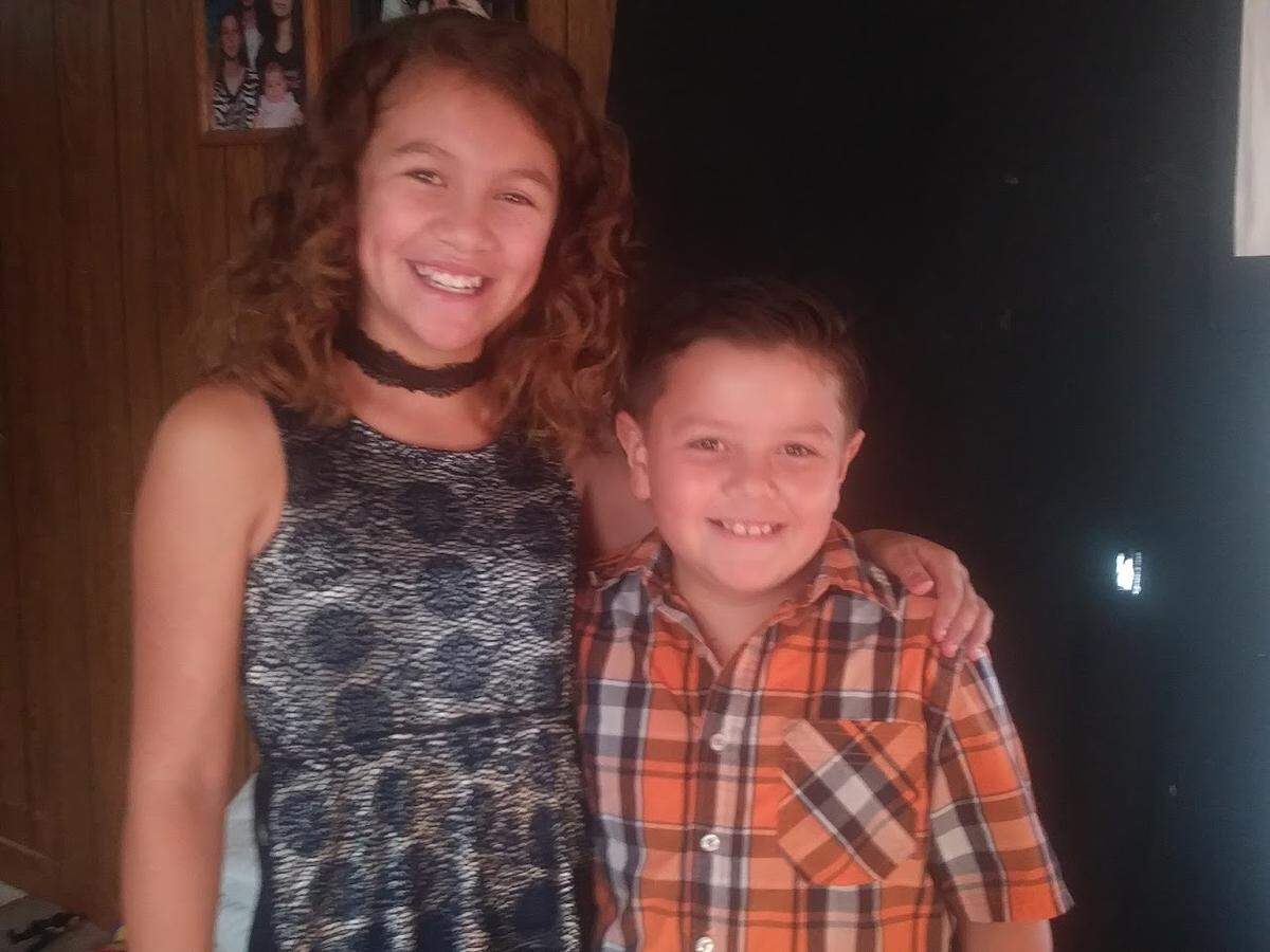 Angelica Santos, shown here in an undated photo with her brother, was a sixth-grade student in Yakima when she told friends that she was dating a Yakima police officer.
