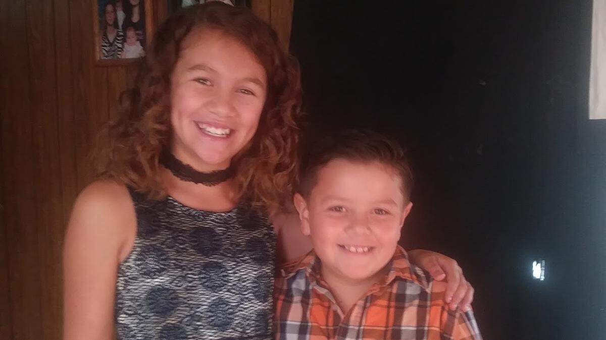 Angelica Santos, shown here in an undated photo with her brother, was a sixth-grade student in Yakima when she told friends that she was dating a Yakima police officer.