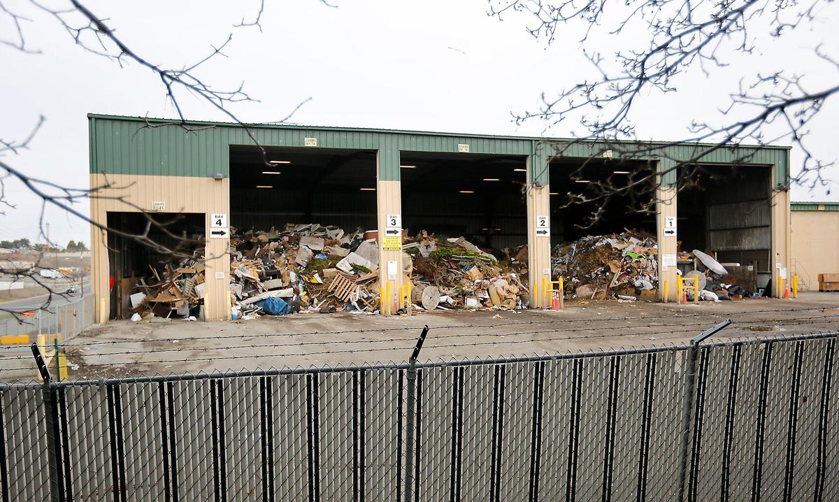 Piled garbage fills the bays at Waste Management’s Kennewick Transfer Station at 2627 S. Ely Street after a jammed compactor system forced a temporary closure of the facility while repairs are made. Company officials said the transfer station should re-open on March 27.