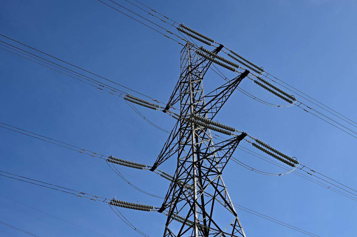 Electricity pylons and power lines are pictured near to Heysham Nuclear Power Station on the north west coast of England.