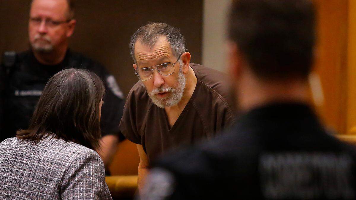 Murder suspect Brian Wilcox talks with an attorney in Benton County Superior Court in a hearing earlier this year.