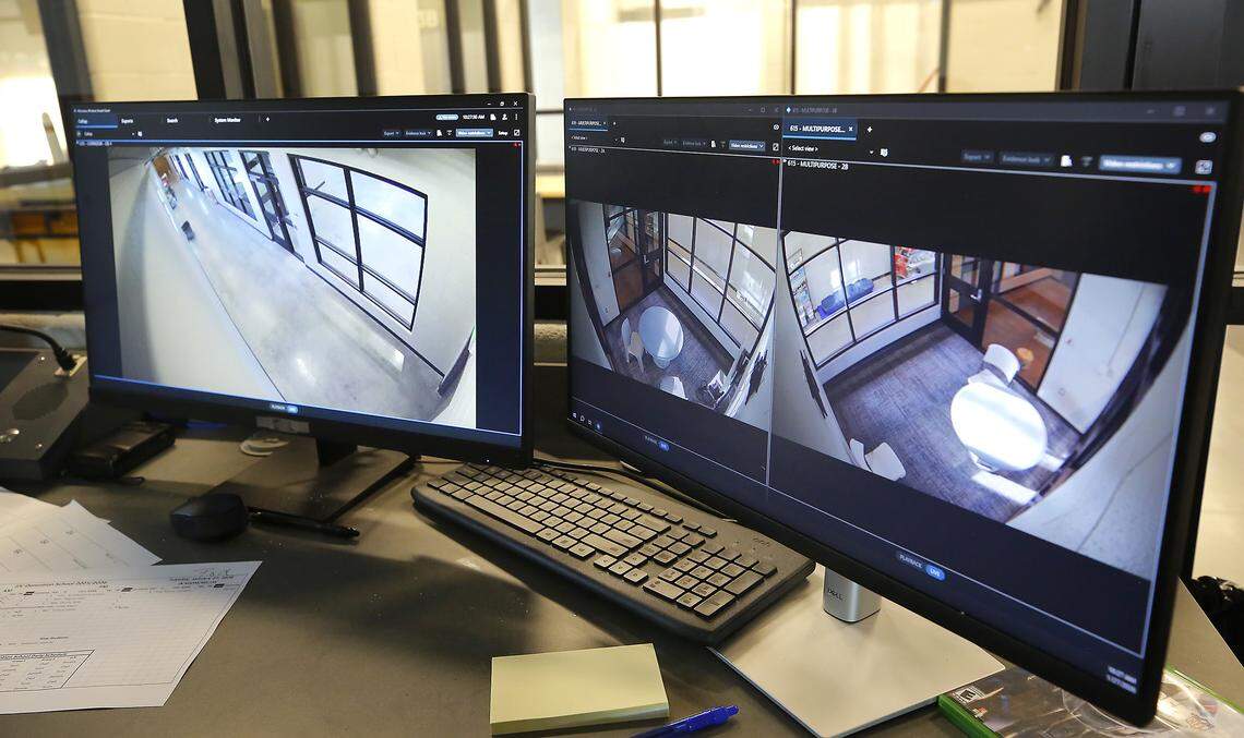 Video monitors in the master control room show various security camera views at the Benton County Juvenile Justice Center. 
