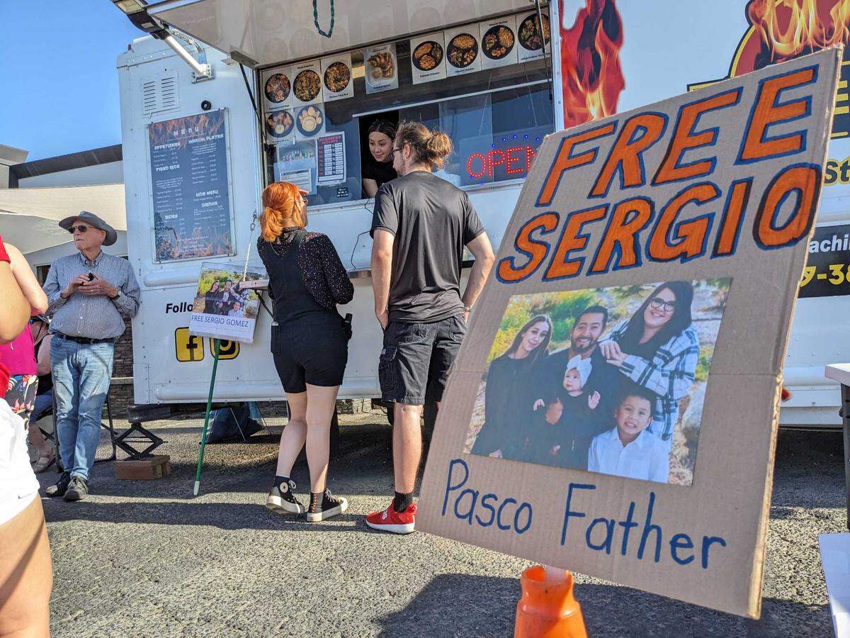 Diners line up at Hibachi Explosion food truck along Clearwater Avenue in Kennewick to support the family after the owner’s husband was detained by federal Immigration and Customs Enforcement. 