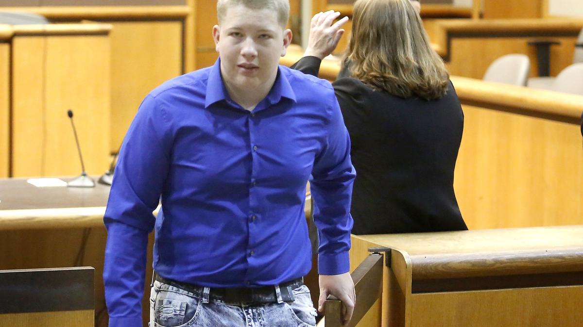 Logan T. Santjer, charged as an adult with raping a young girl at his mother’s Kennewick daycare, appears Thursday in Benton County Superior Court. He asked to delay his trial four months since a new attorney is on the case.
