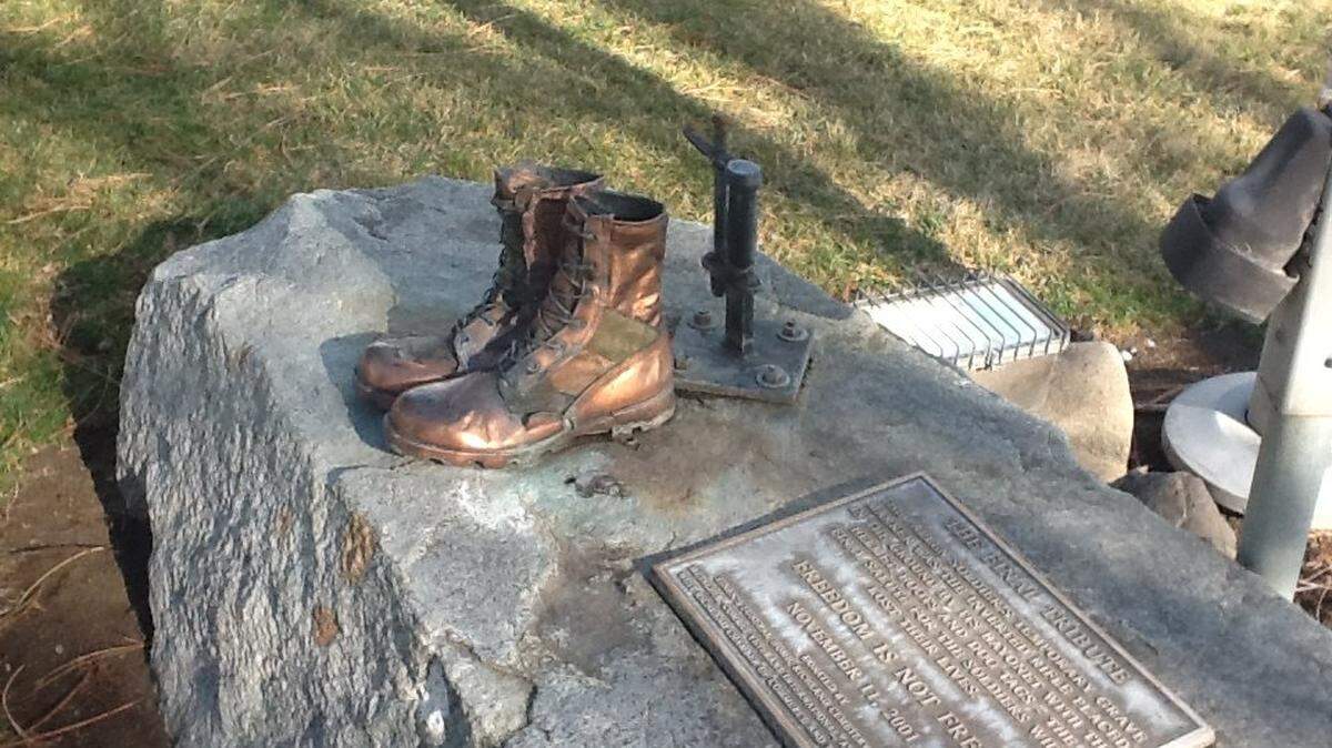 The boots and plaque are all that remain of the veterans memorial at Flat Top Park in West Richland.