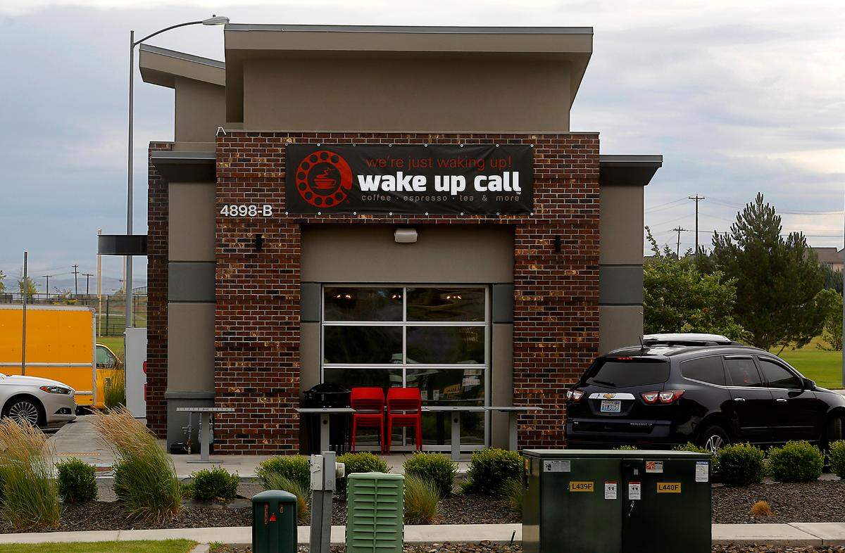 Temporary signs for the new Wake Up Call Coffee locations have started going up in the Tri-Cities.