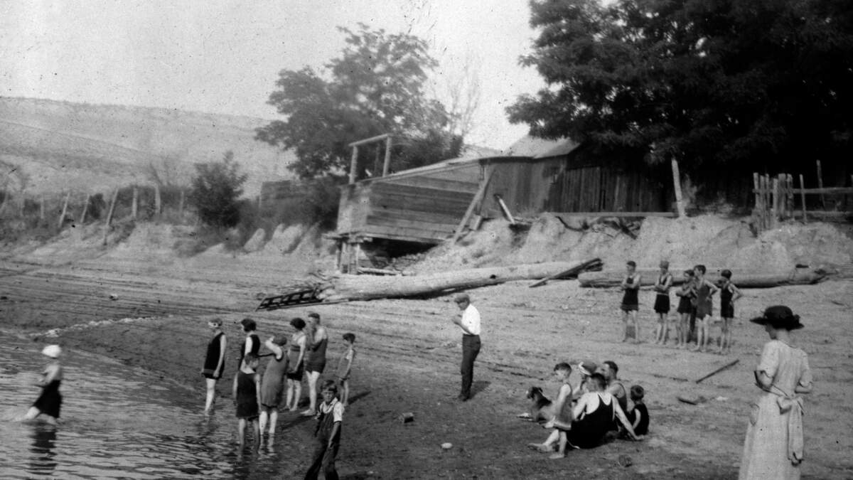 Children swim in the Columbia River at White Bluffs in 1925. The land now is part of the Hanford nuclear reservation.