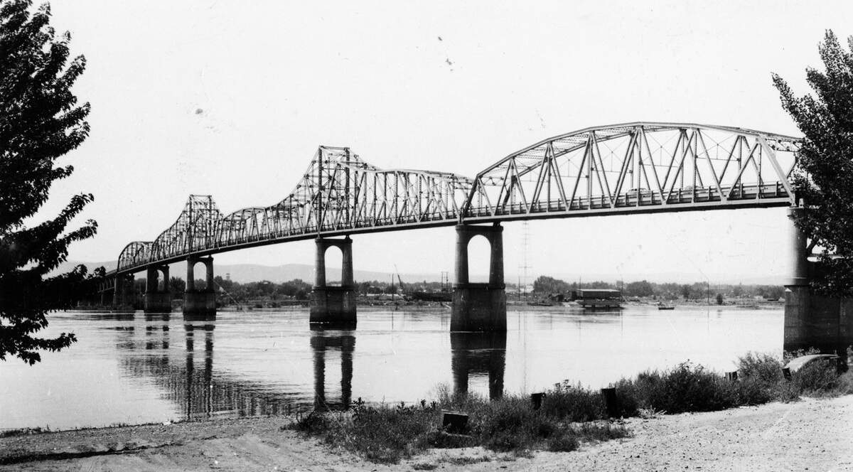 A 1948 view of the green bridge over the Columbia River linking Kennewick and Pasco, which was built in 1922 to complete the northern route of the trancontinental highway from the east to west coast.