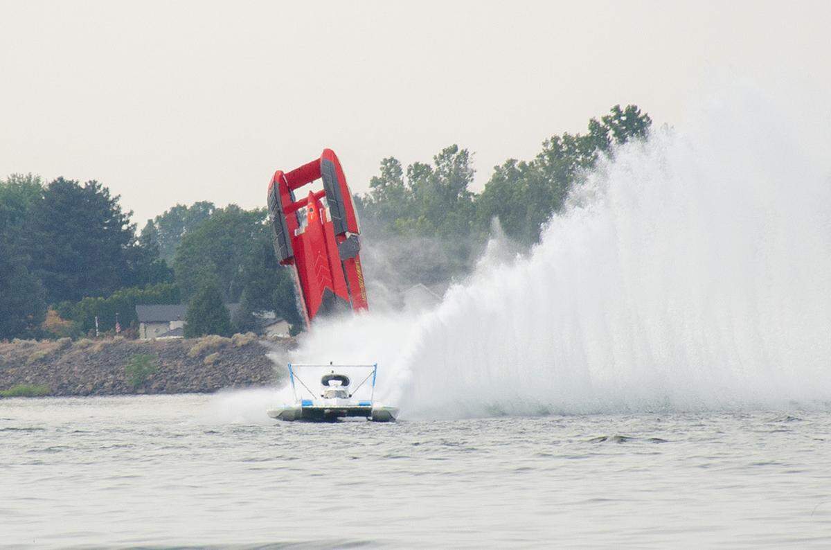 J. Michael Kelly’s U-1 Beacon Electric hydroplane flips Saturday, July 27, during the first H-1 Unlimited heat of the 2024 Water Follies Apollo Columbia Cup. The plane got caught tailing Corey Peabody in the U-9 Beacon Plumbing.