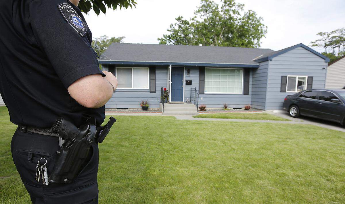 Kennewick police helped the FBI investigate and arrest two Tri-Cities men accused of selling opioids to a Kennewick man who overdosed and died in October 2017. Investigators searched this house at 40 S. Vancouver St. in connection with the case on May 17, 2018.