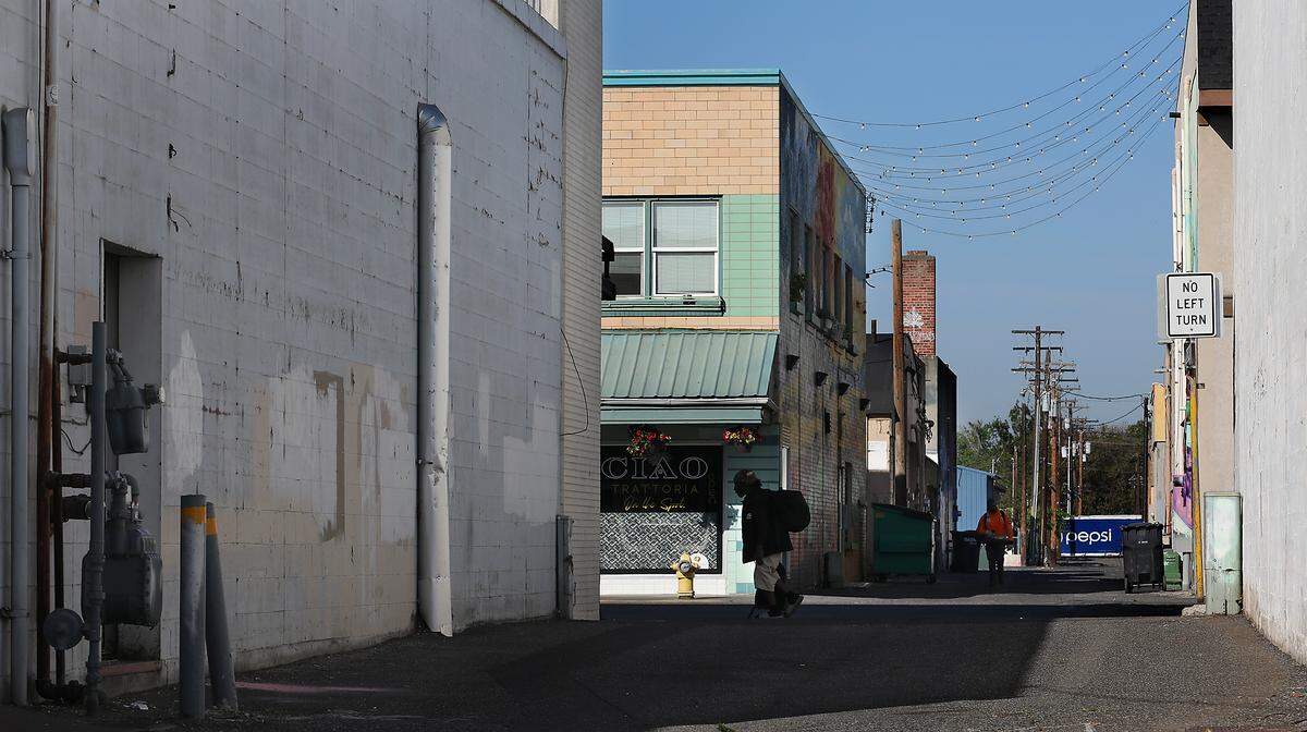 This alley off Fourth Avenue between Lewis and Clark Streets had lights strung by building owners.
