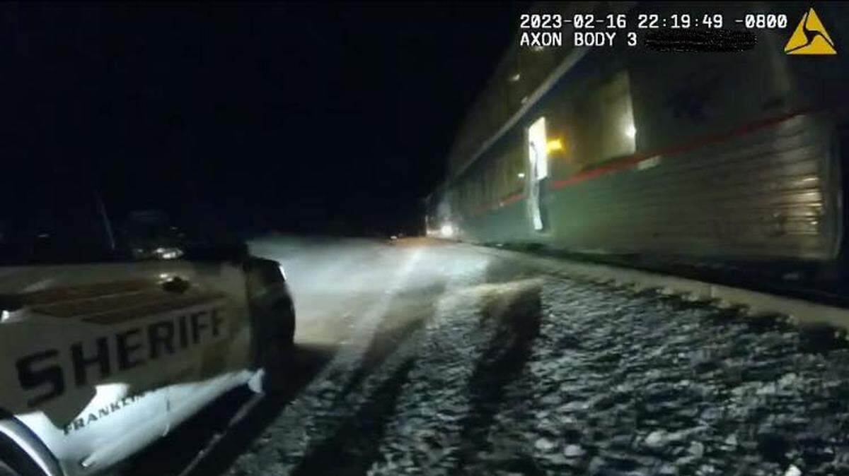 An Amtrak passenger allegedly called a man a racial slur and threatened him with a knife on the train.