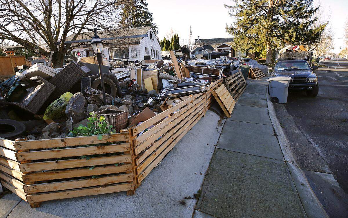 The garbage-clogged home at 1312 Hains Ave.  in Richland sold at a foreclosure auction Friday at the Benton County Justice Center in Kennewick. 