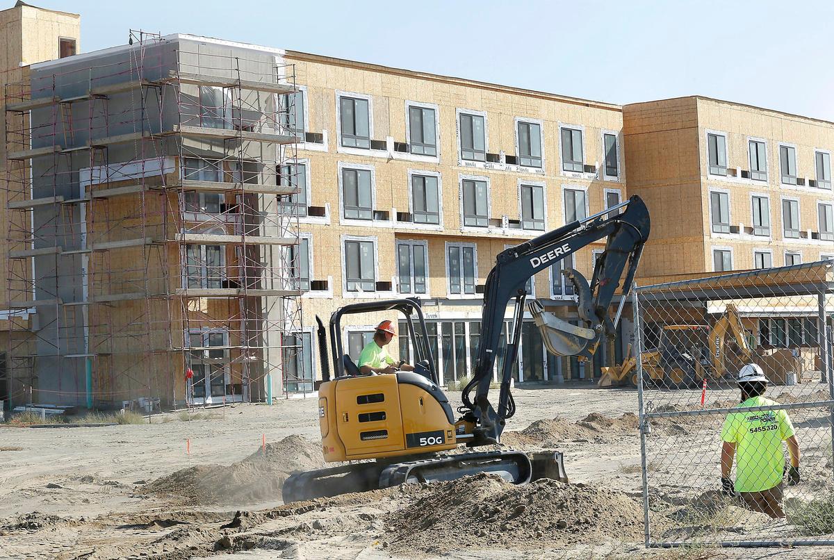 Workers from Absolute Power install underground electrical conduit for the new 99-room Courtyard by Marriott hotel at the Tri-Cities Airport off Argent Road in Pasco.