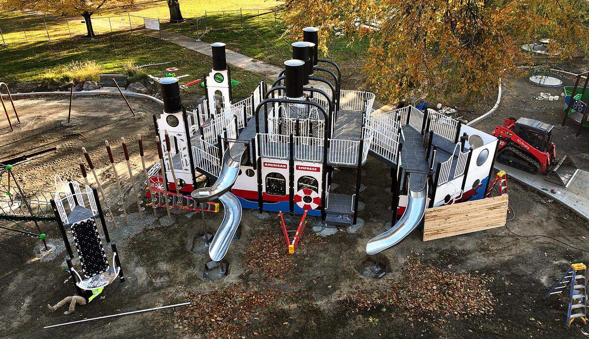 Ramiro Ochoa, an employee of Steves Install of Spokane, works on assembling new playground equipment in Richland’s Howard Amon Park near Lee Boulevard. The playground is cruise boat themed.