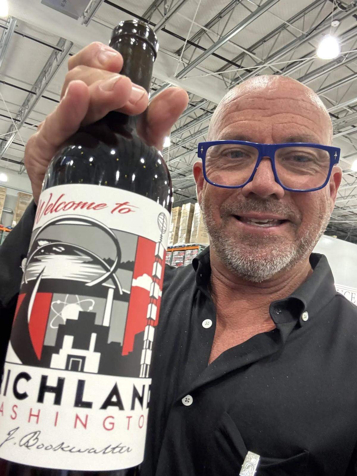 Tri-Cities winemaker John Bookwalter autographed bottles of a red vintage from J. Bookwalter Winery with a special label: “Welcome to Richland” during the grand opening of Costco in Richland.