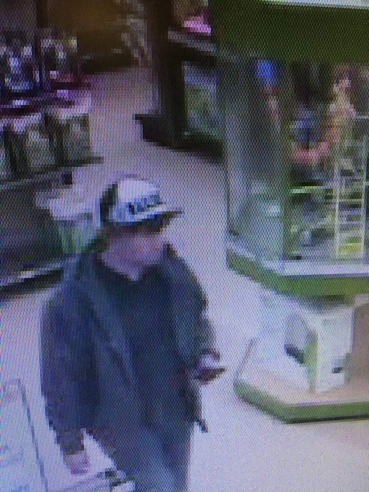Richland police are trying to identify this man who grabbed two snakes from an enclosure at a Richland pet store.