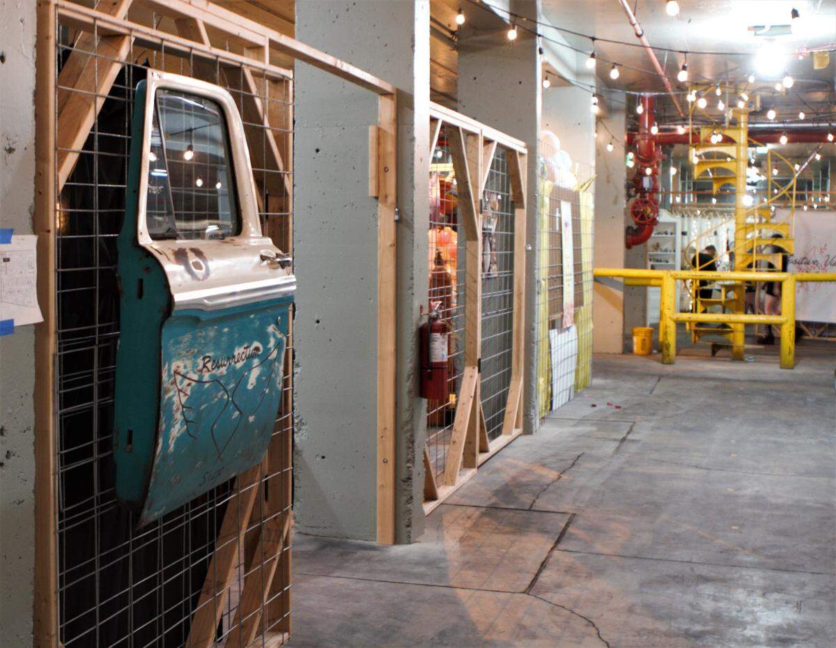 A vehicle door-turned-wall-decor hangs outside a stall at the Public Market at Columbia River Warehouse. The market is now open, at 10 E. Bruneau Ave. in downtown Kennewick.