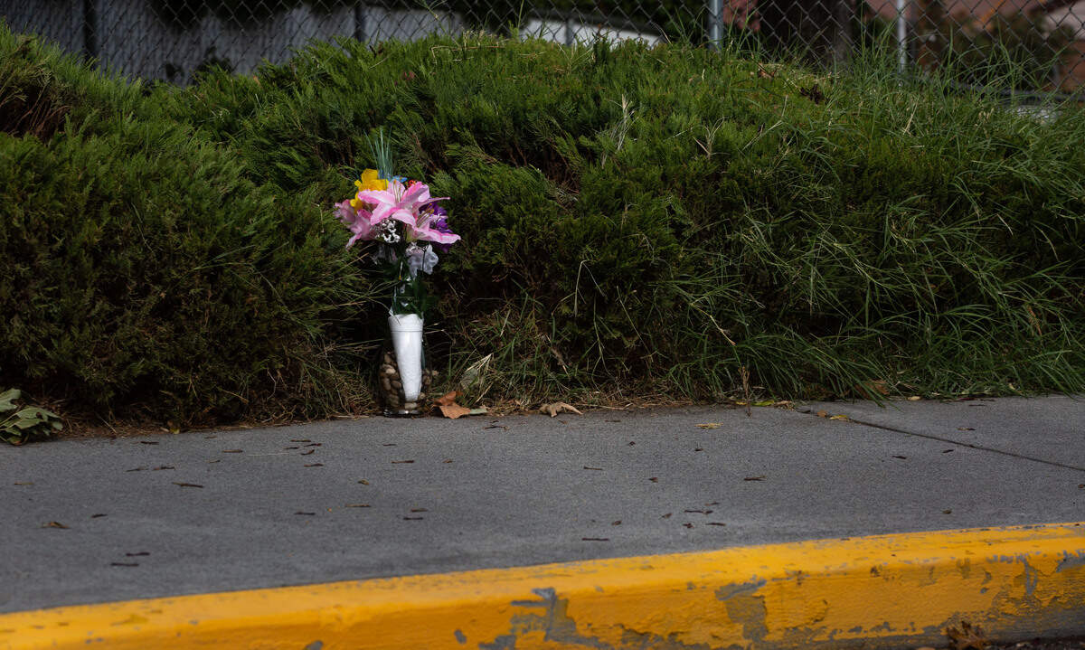 A vase of faux flowers stands as a memorial for the Pasco School District bus driver Richard Lenhart, who was stabbed in 2021 outside of Longfellow Elementary in front of over 30 children who had already boarded for afternoon dismissal.